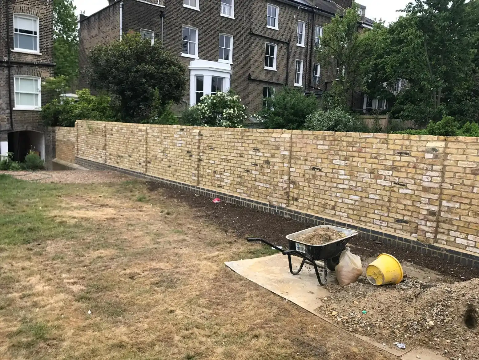 New brick wall in the garden.