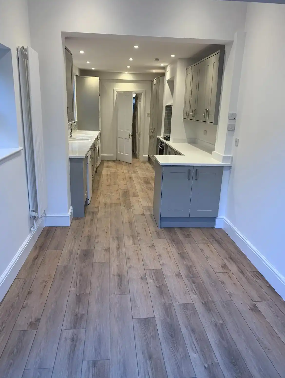 Wooden floor in a new bathroom.